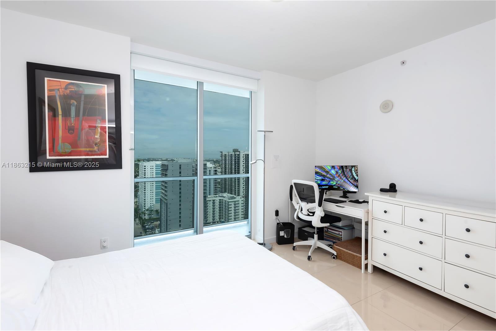 1111 Southwest 1st Avenue, Unit 3125N Miami, FL 33130 - Photo 14 of 49 a bedroom with a bed and a window
