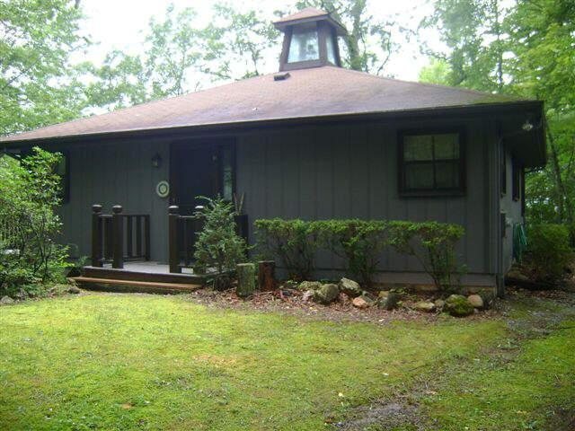 747 Western Way Rabun Gap, GA 30568 - Photo 1 of 1 a front view of a house with garden