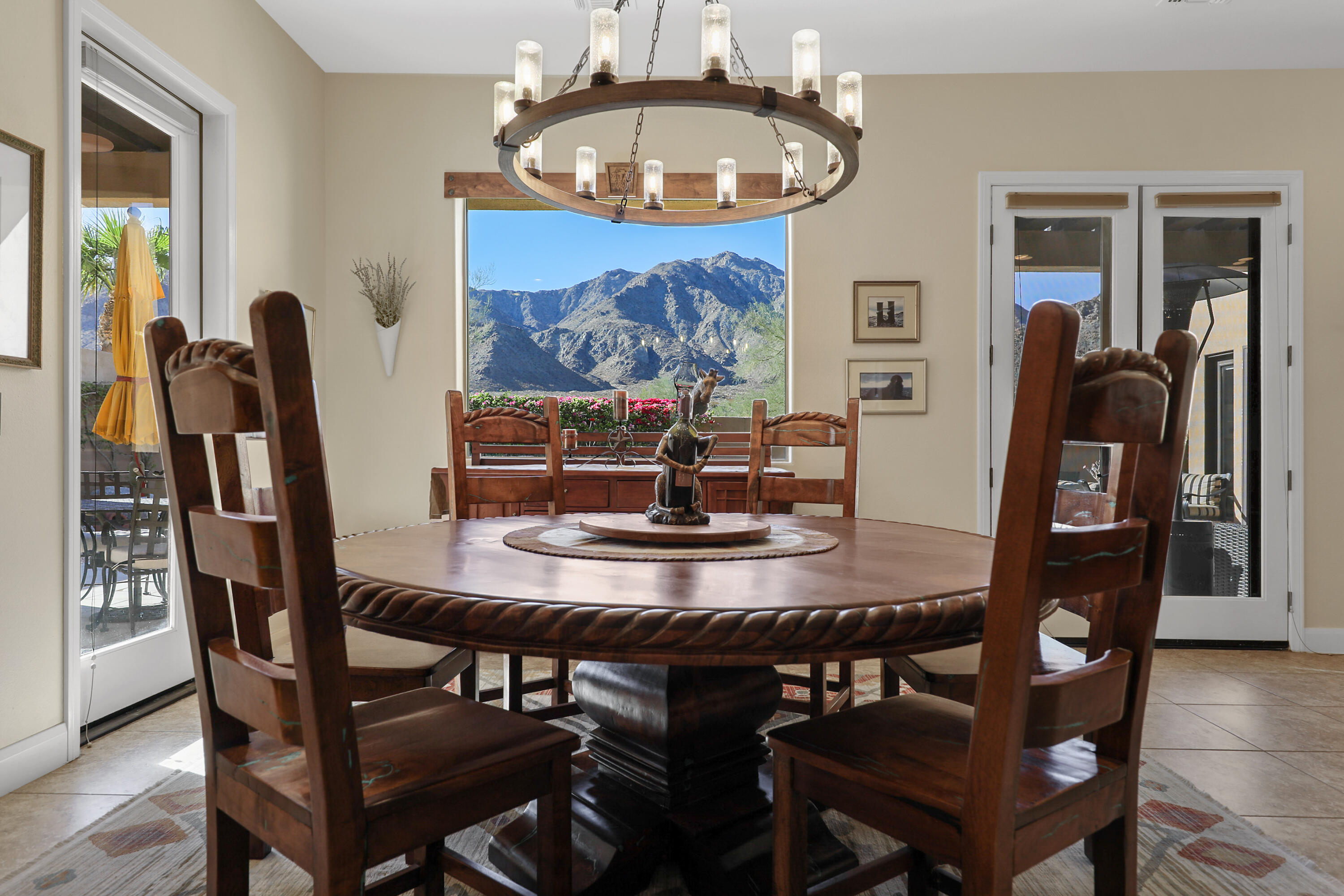 54855 Avenida Madero La Quinta, CA 92253 - Photo 13 of 48 a view of a dining room with furniture and a chandelier