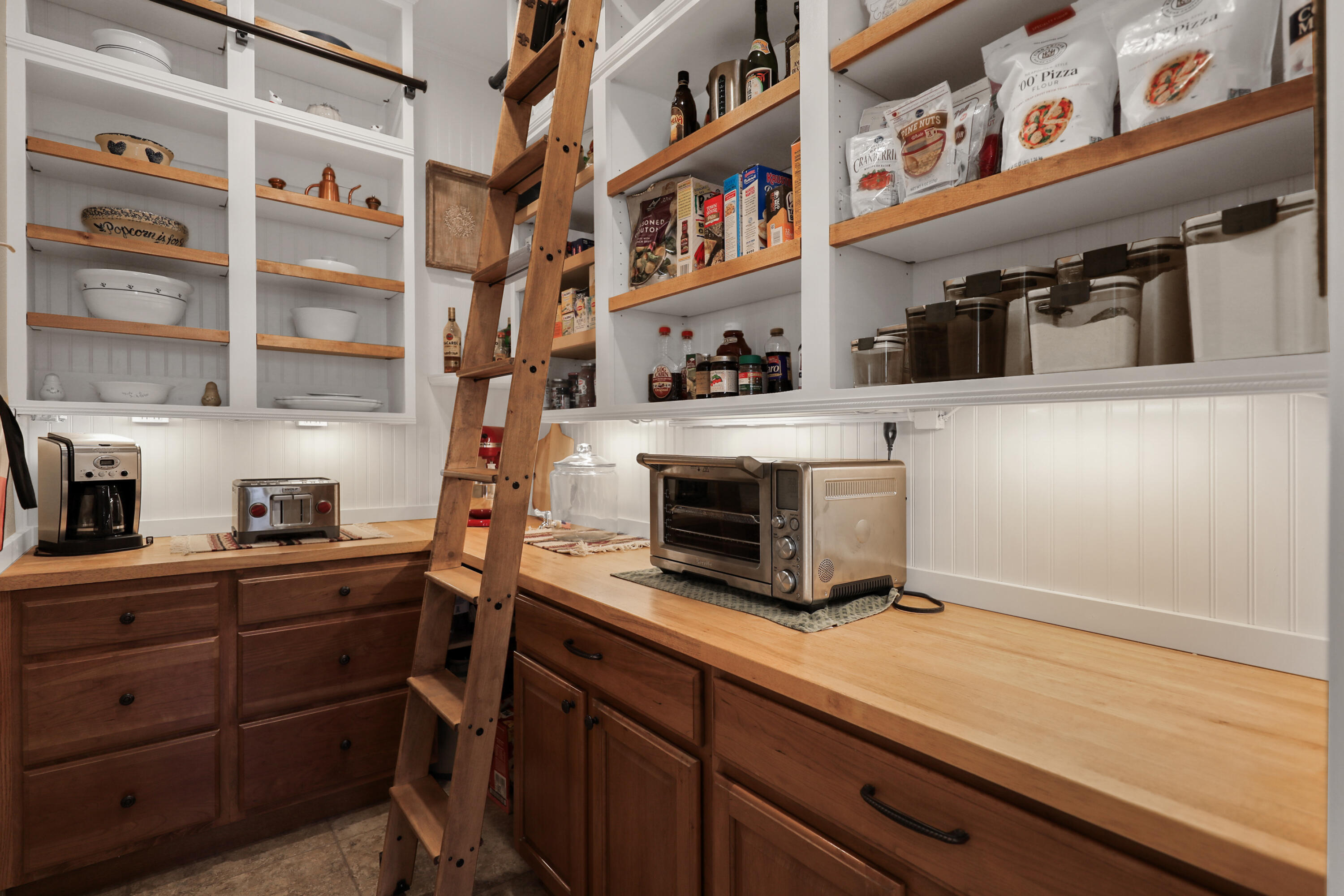 54855 Avenida Madero La Quinta, CA 92253 - Photo 18 of 48 a kitchen with stainless steel appliances a cabinets and wooden floor