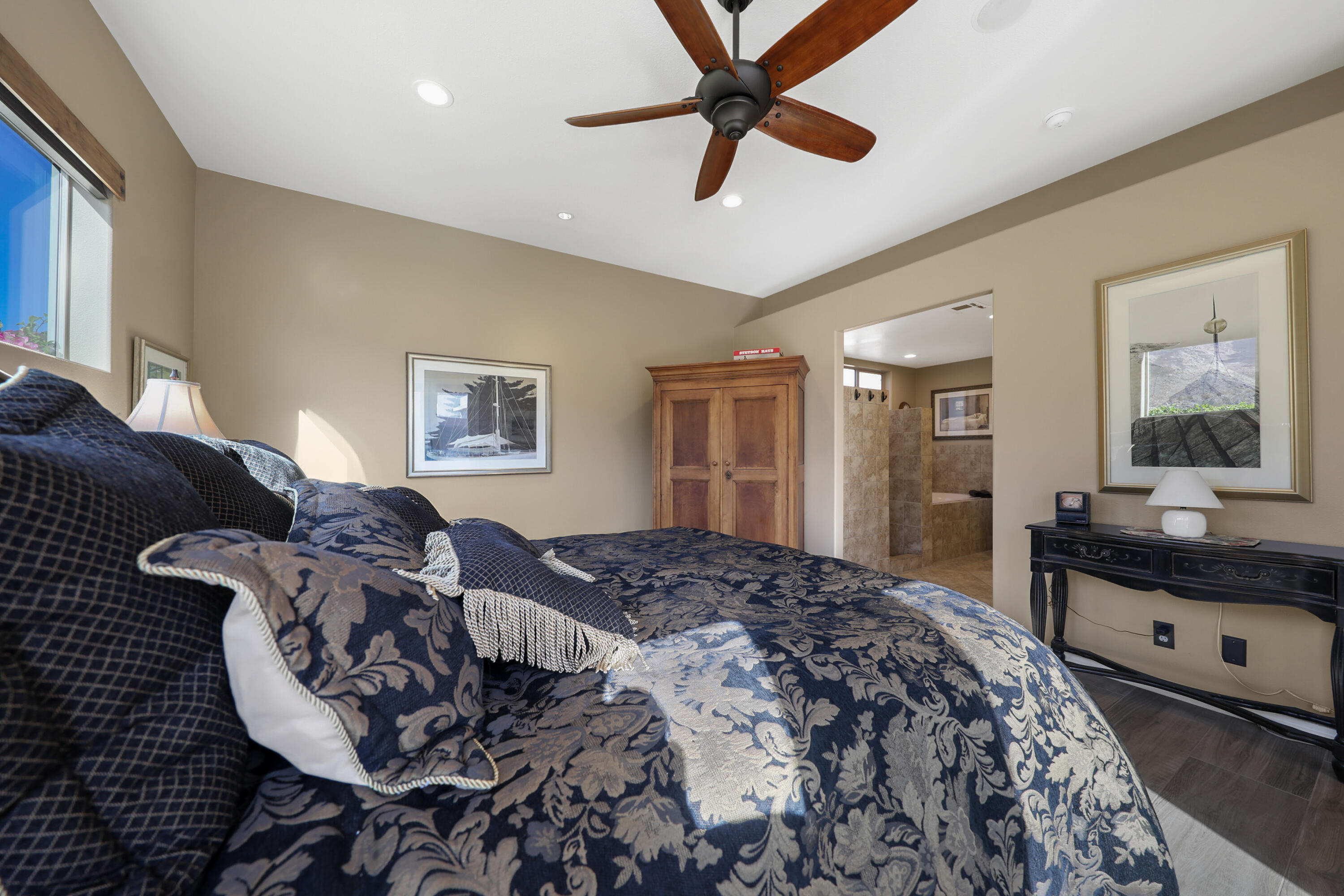 54855 Avenida Madero La Quinta, CA 92253 - Photo 23 of 48 a bedroom with a bed and a dresser