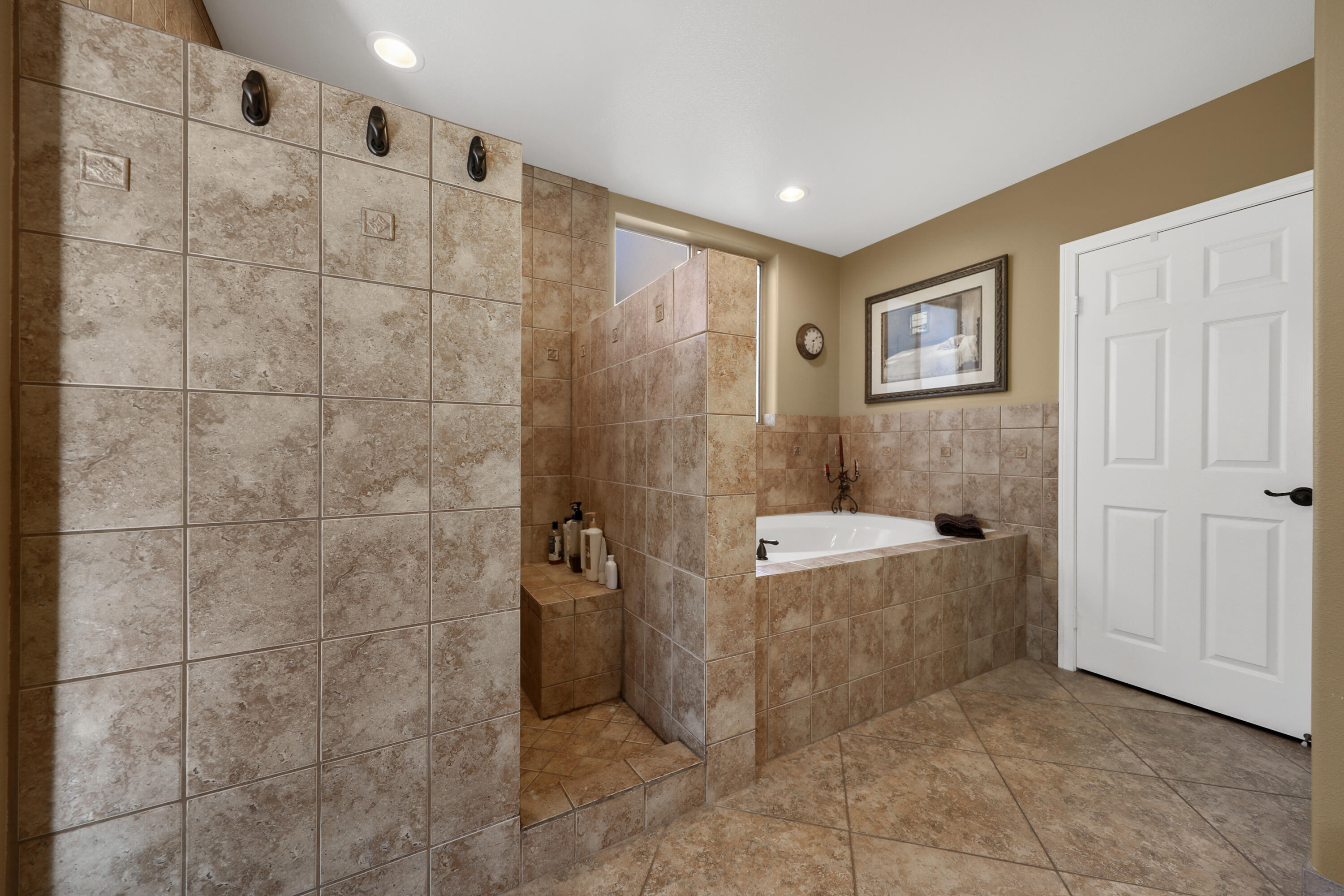 54855 Avenida Madero La Quinta, CA 92253 - Photo 25 of 48 a bathroom with a tub and shower