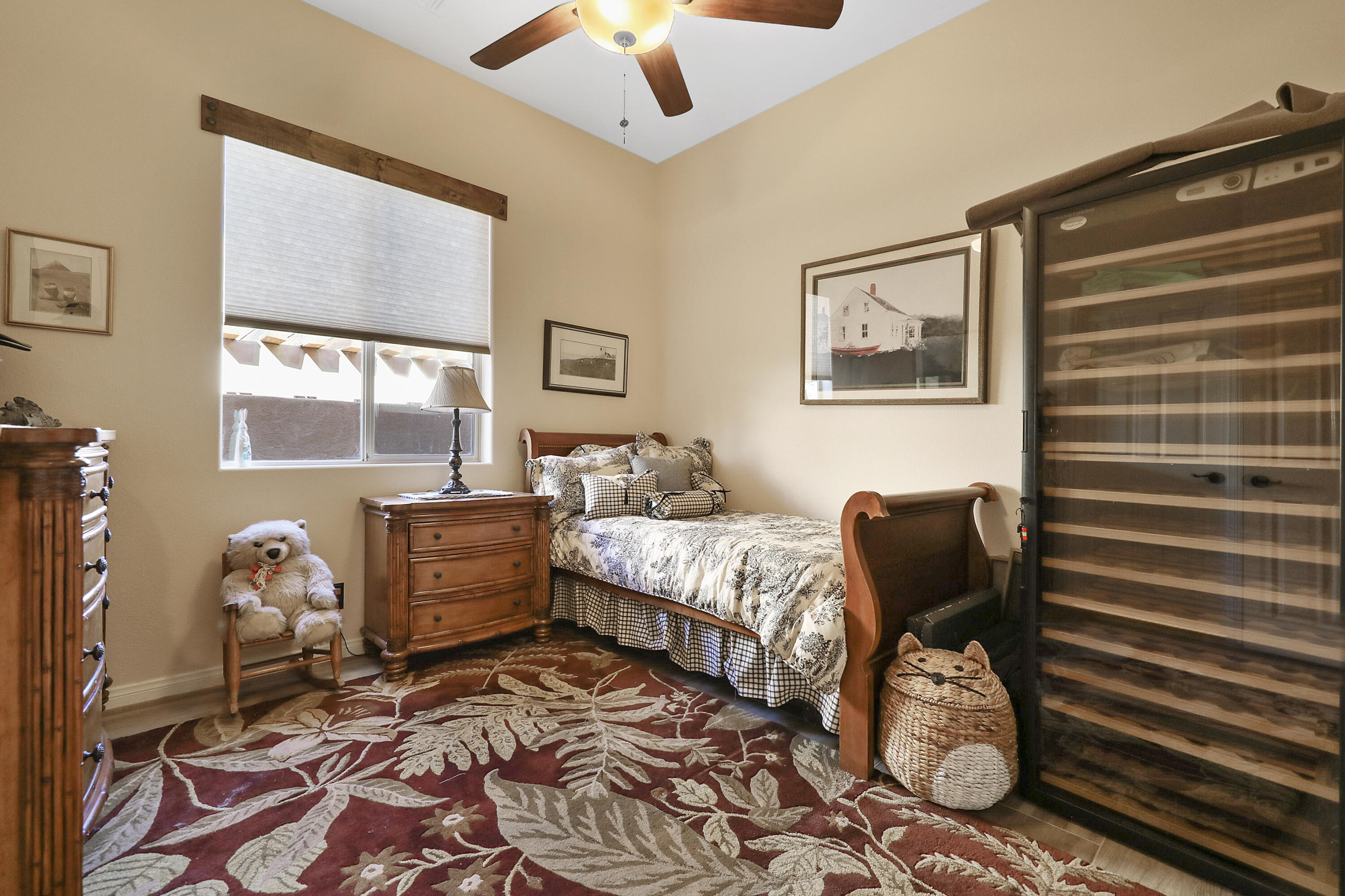 54855 Avenida Madero La Quinta, CA 92253 - Photo 29 of 48 a bedroom with furniture and a window