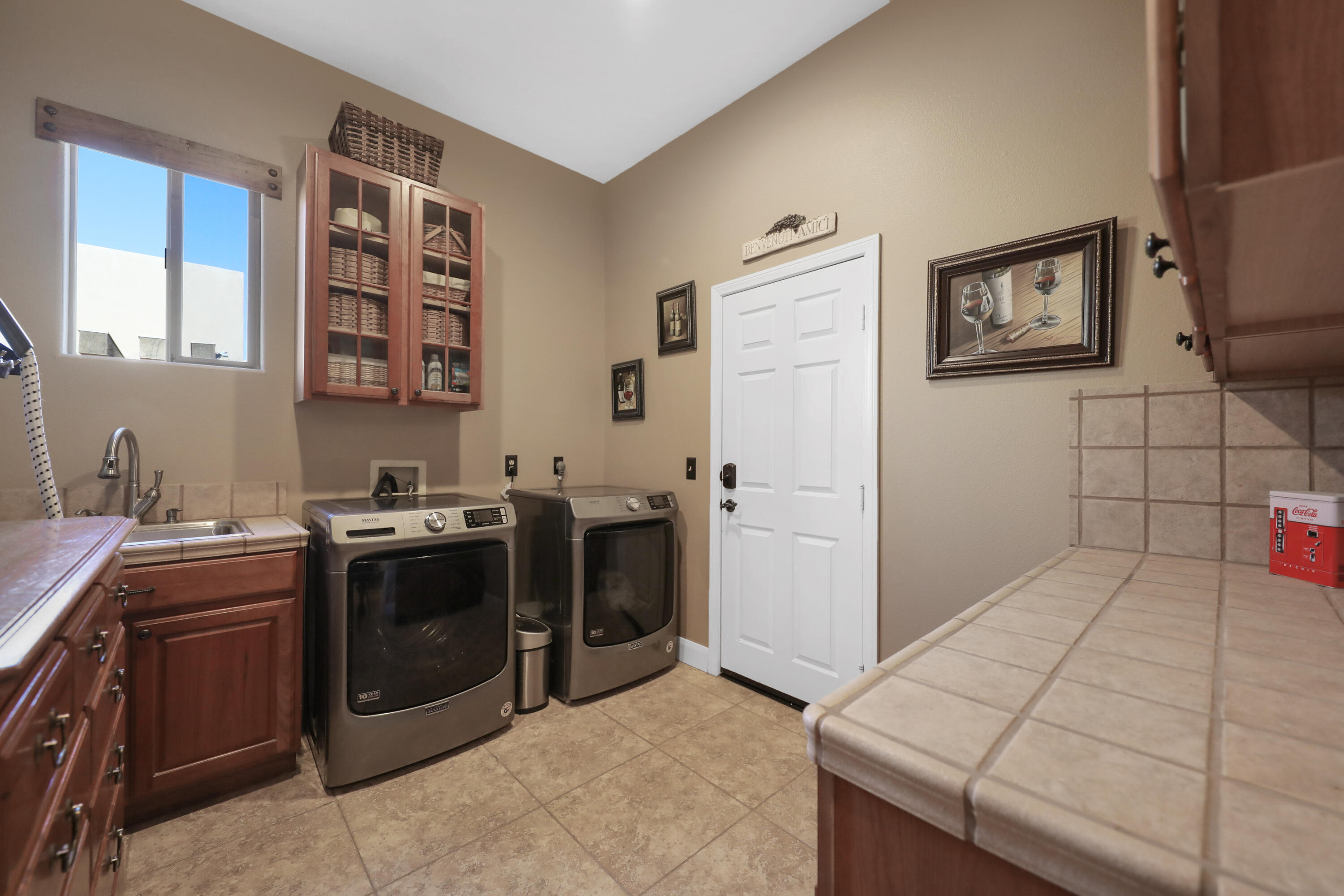 54855 Avenida Madero La Quinta, CA 92253 - Photo 32 of 48 a kitchen with a stove and a sink