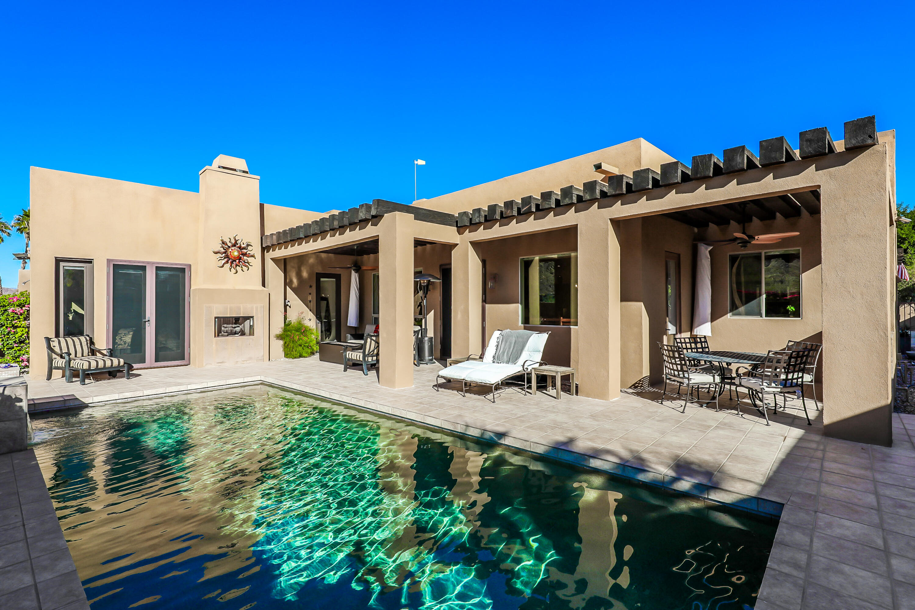 54855 Avenida Madero La Quinta, CA 92253 - Photo 33 of 48 a front view of a house with patio