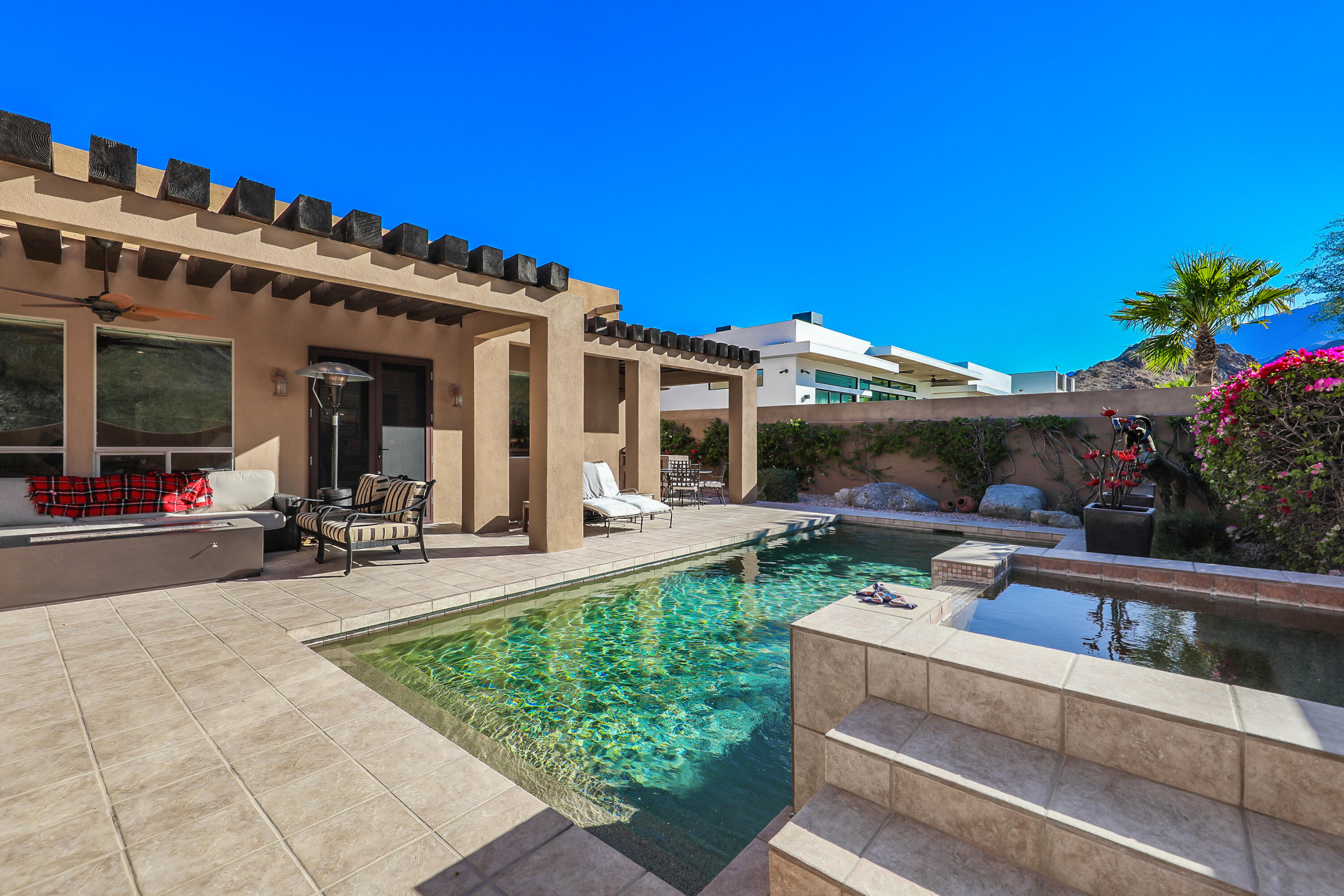 54855 Avenida Madero La Quinta, CA 92253 - Photo 34 of 48 a view of a house with sitting area and furniture