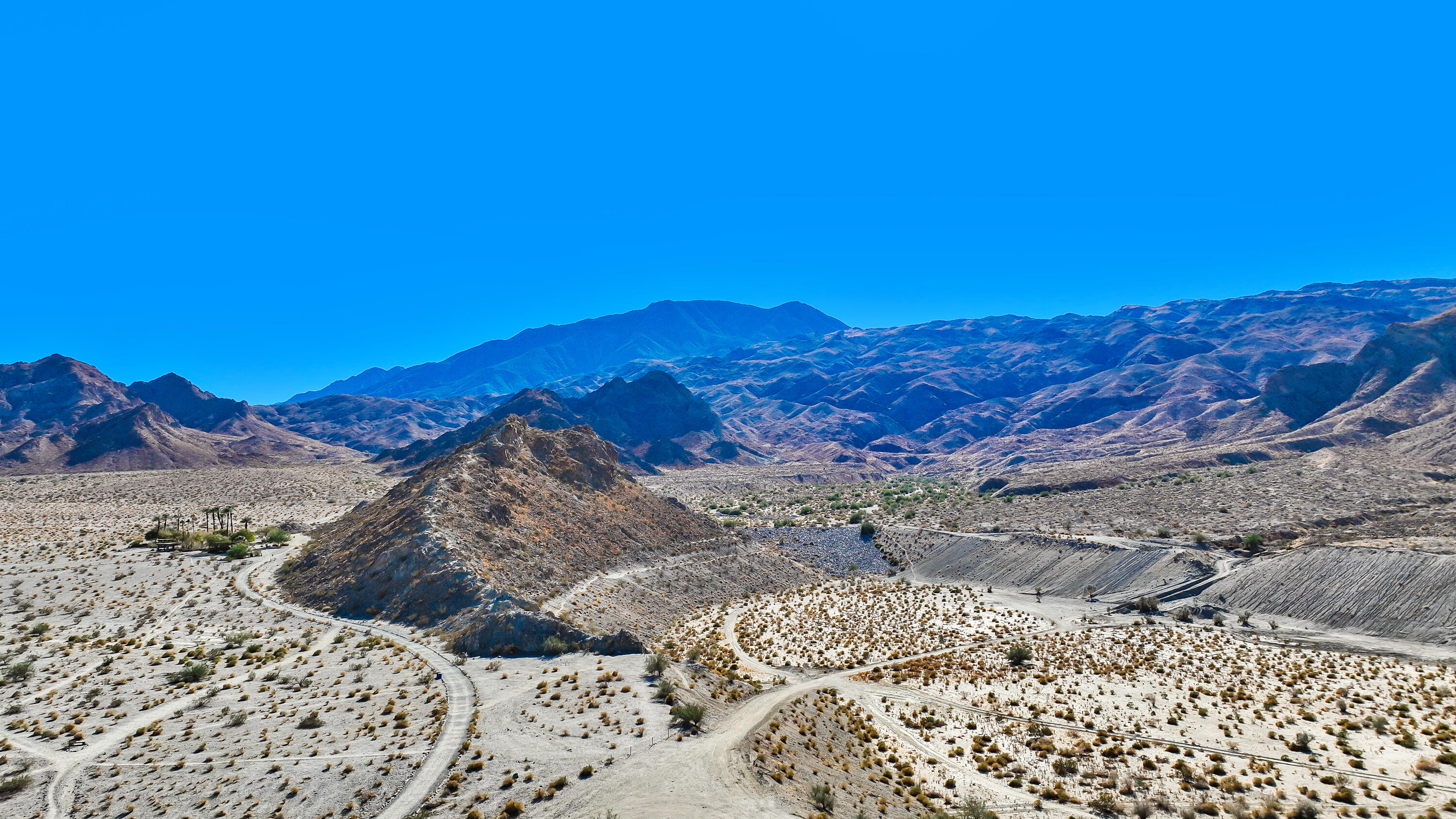 54855 Avenida Madero La Quinta, CA 92253 - Photo 47 of 48 a view of a dry yard with mountains in the background