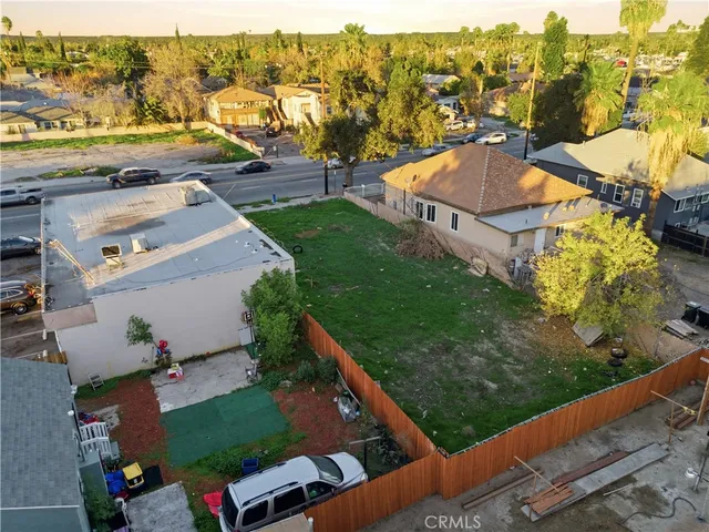 an aerial view of residential house with outdoor space