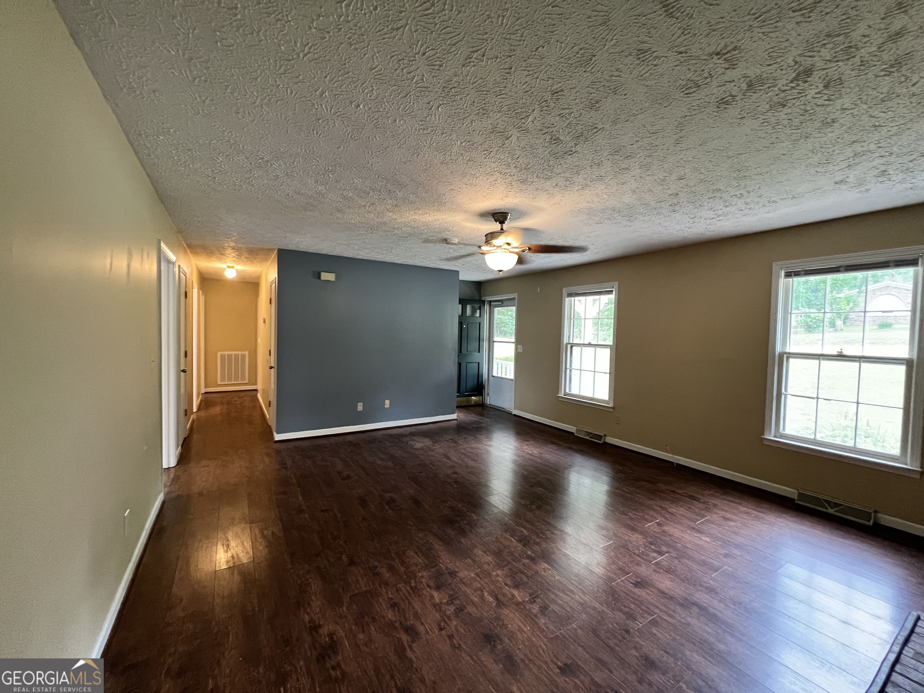 32 Ford Drive Southeast Rome, GA 30161 - Photo 5 of 49 an empty room with wooden floor and windows