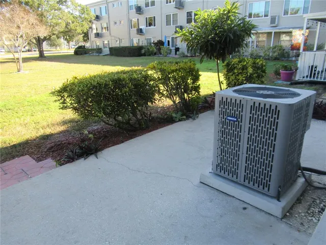 a view of a yard with an outdoor space