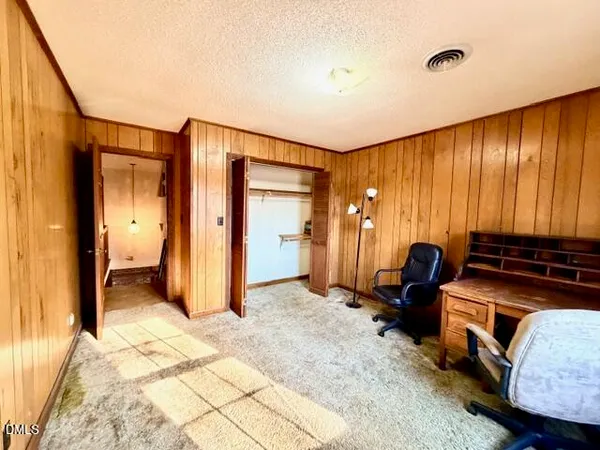 a bathroom with a shower and a toilet