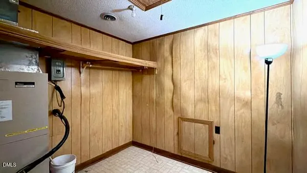 a bathroom with a sink a mirror and a shower