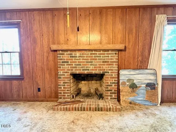 a view of a porch with a hardwood