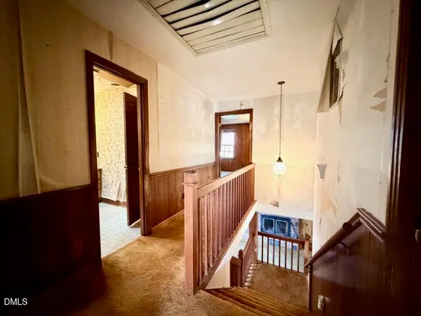 a view of house with a yard