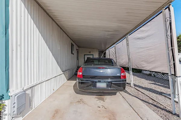a view of a car parked in front of a house