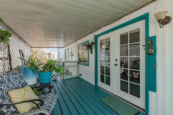 a view of a porch with furniture