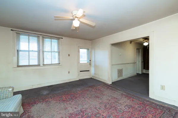 a view of a house with a large window