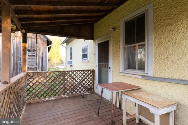 a view of outdoor space with deck and yard