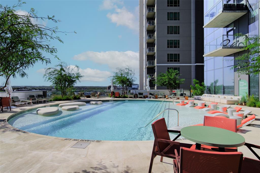 44 East Avenue, Unit 3109 Austin, TX 78701 - Photo 32 of 37 Community pool with a patio area