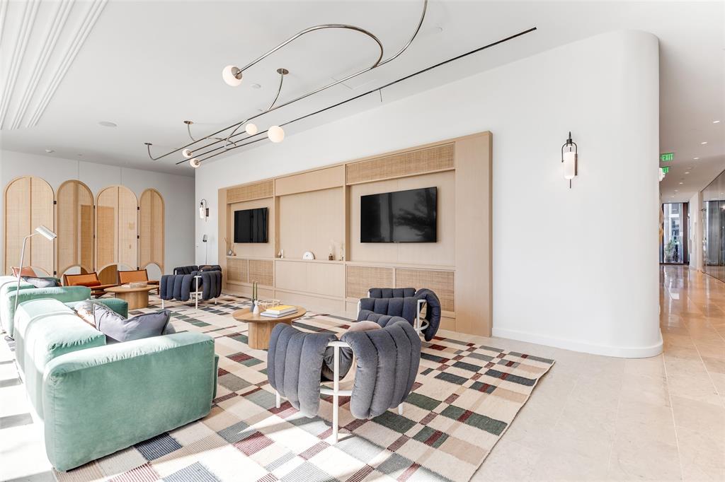 44 East Avenue, Unit 3109 Austin, TX 78701 - Photo 33 of 37 Living area featuring baseboards