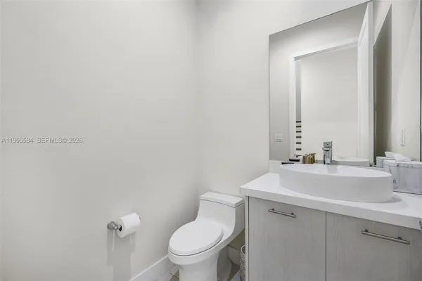 a bedroom with furniture and a book shelf