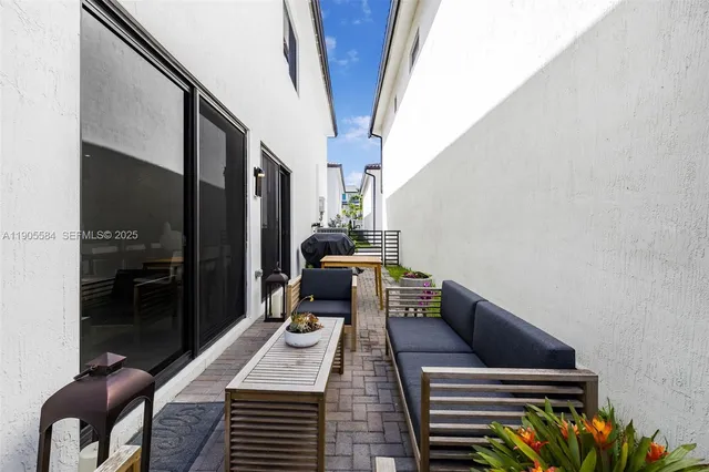 a view of outdoor space with swimming pool and furniture