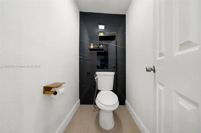 a bathroom with a toilet