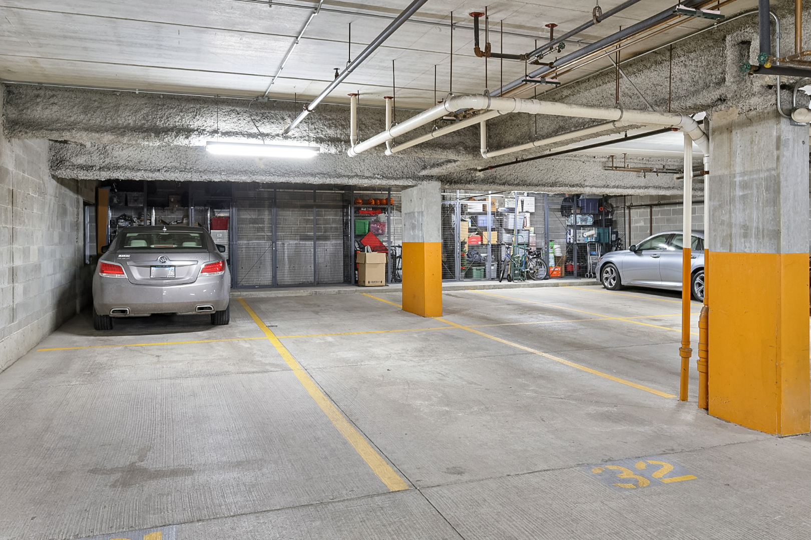 135 South York Street, Unit 314 Elmhurst, IL 60126 - Photo 19 of 24 a view of parking garage with cars