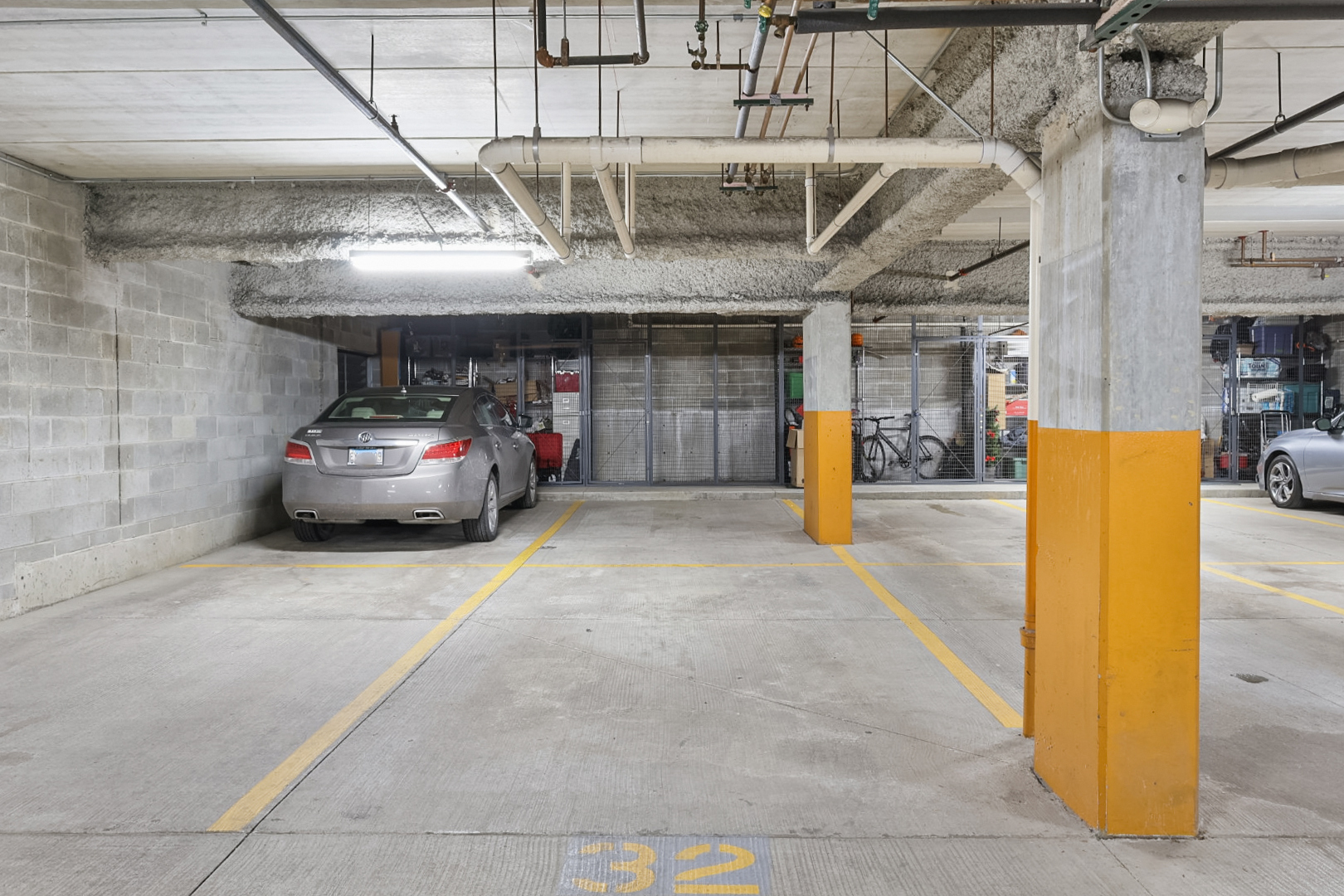 135 South York Street, Unit 314 Elmhurst, IL 60126 - Photo 20 of 24 a view of parking garage with cars