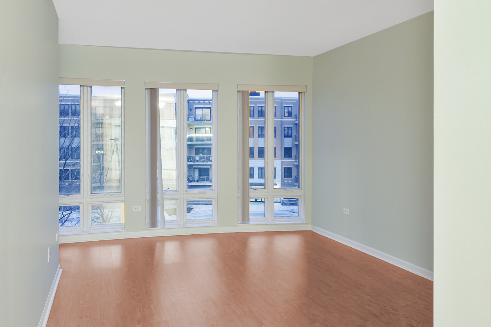135 South York Street, Unit 314 Elmhurst, IL 60126 - Photo 5 of 24 a view of an empty room with a window