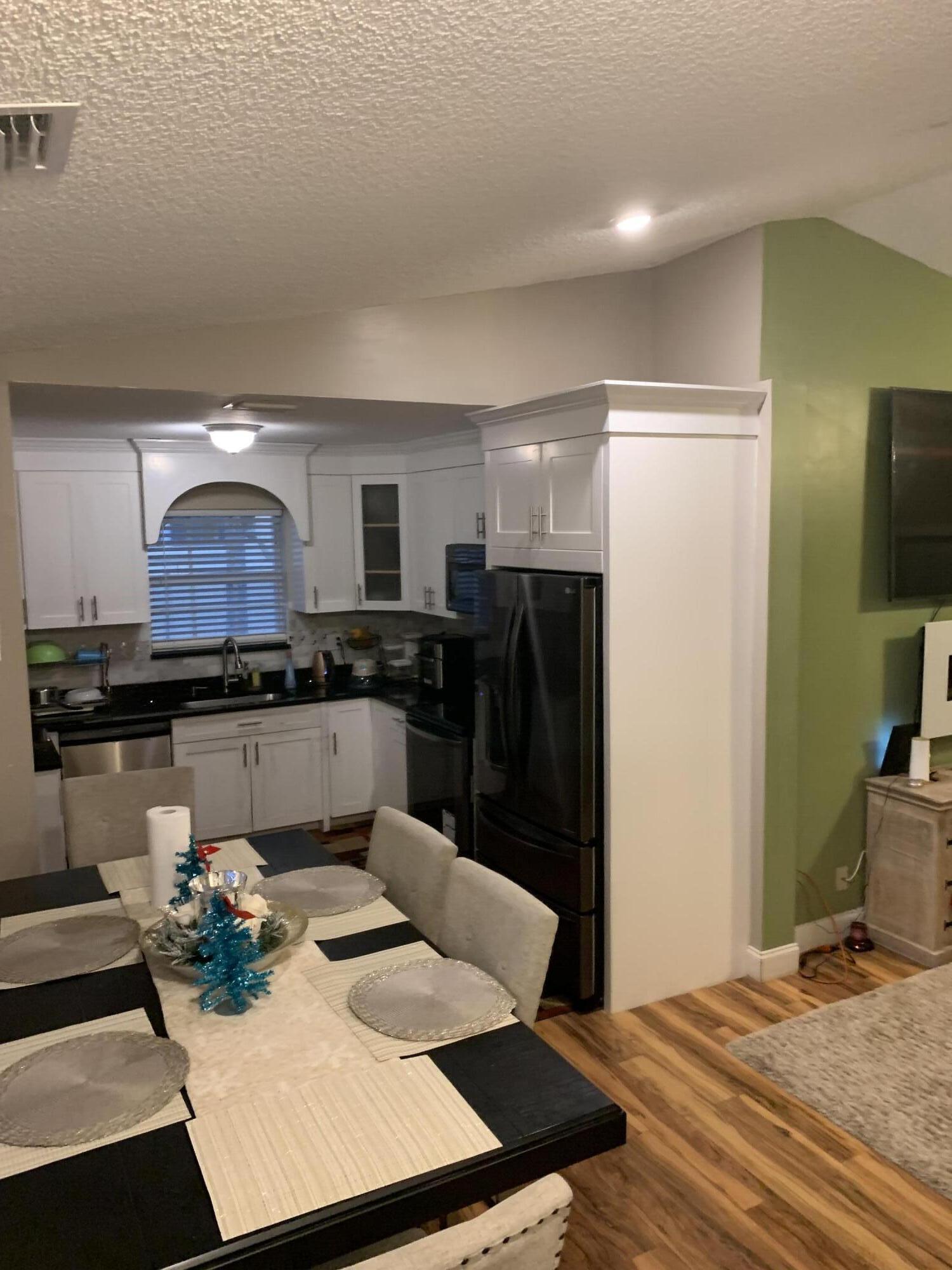 1345 West 34th Street Riviera Beach, FL 33404 - Photo 5 of 19 Kitchen - Dining