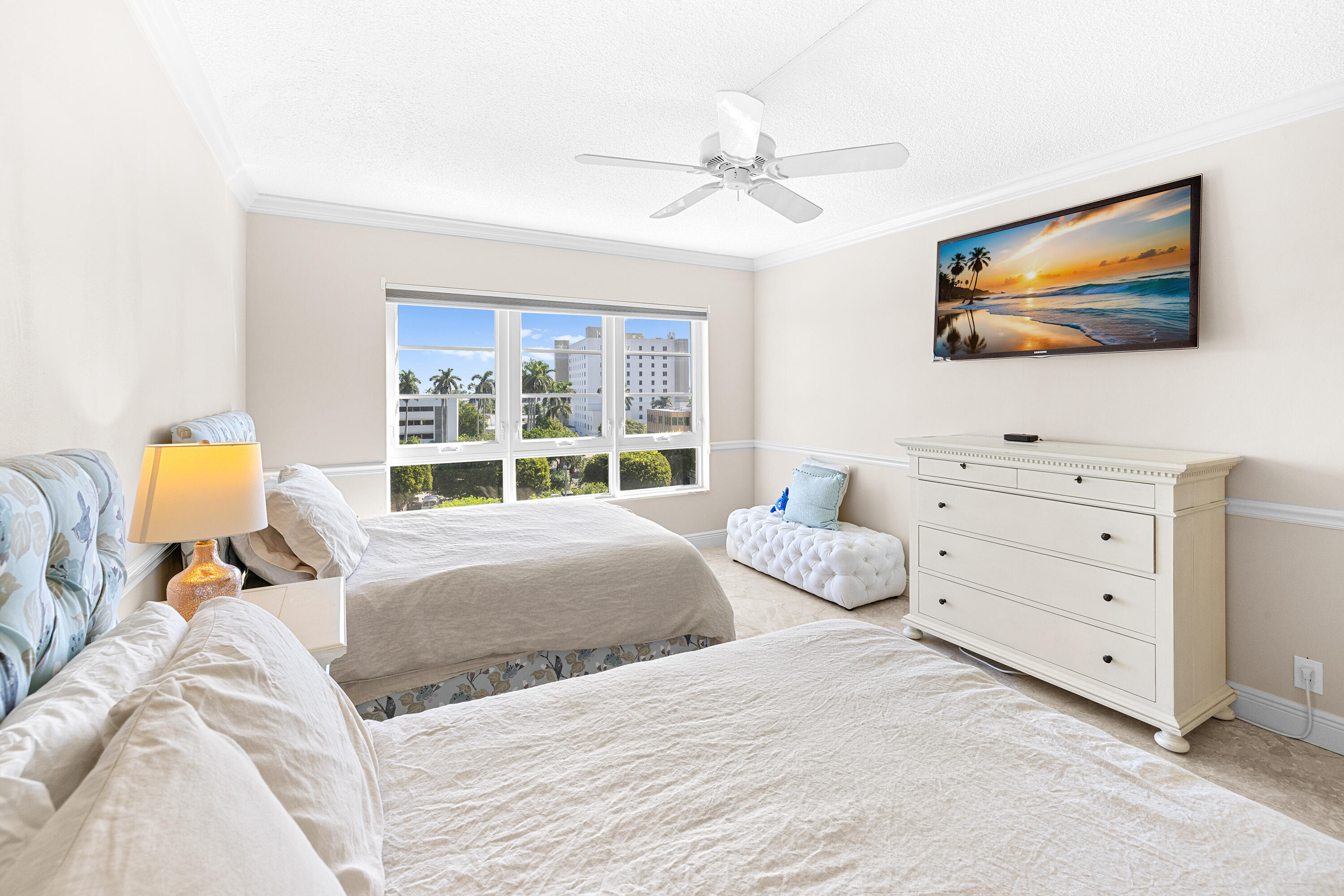 50 E Road, Unit 6E Delray Beach, FL 33483 - Photo 13 of 36 a bedroom with a bed and wooden floor