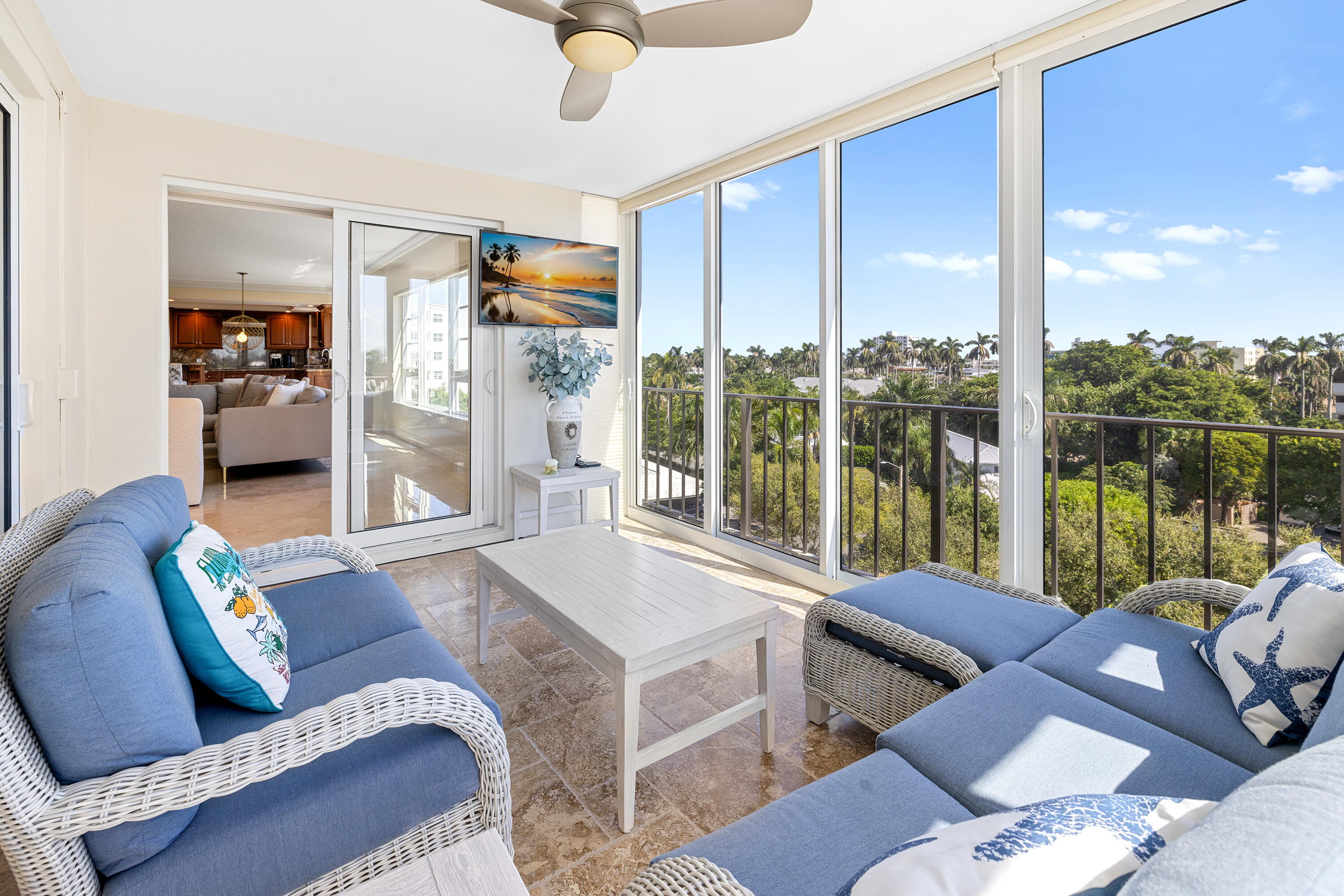 50 E Road, Unit 6E Delray Beach, FL 33483 - Photo 18 of 36 a living room with furniture and a floor to ceiling window