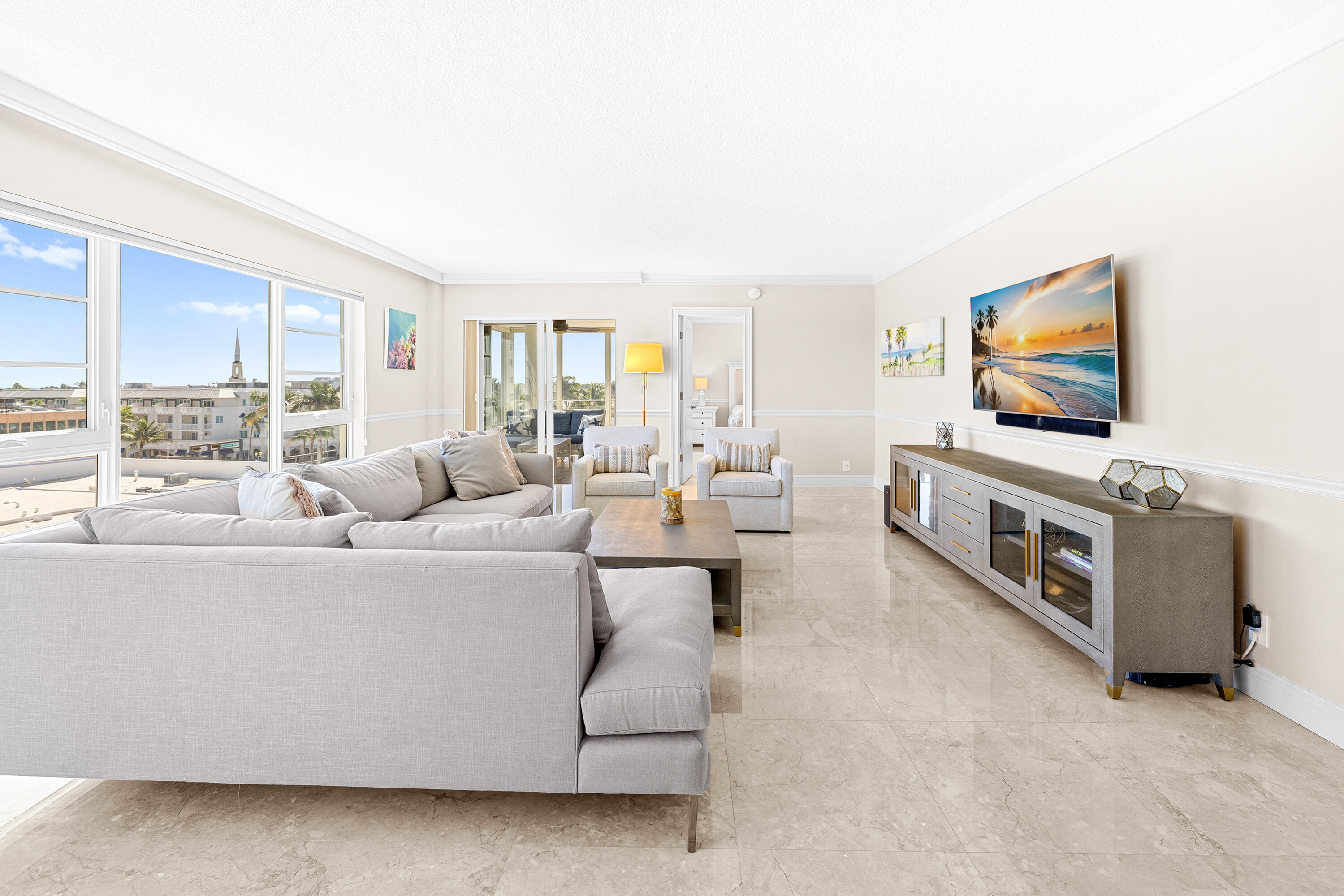 50 E Road, Unit 6E Delray Beach, FL 33483 - Photo 2 of 36 a living room with furniture and a flat screen tv