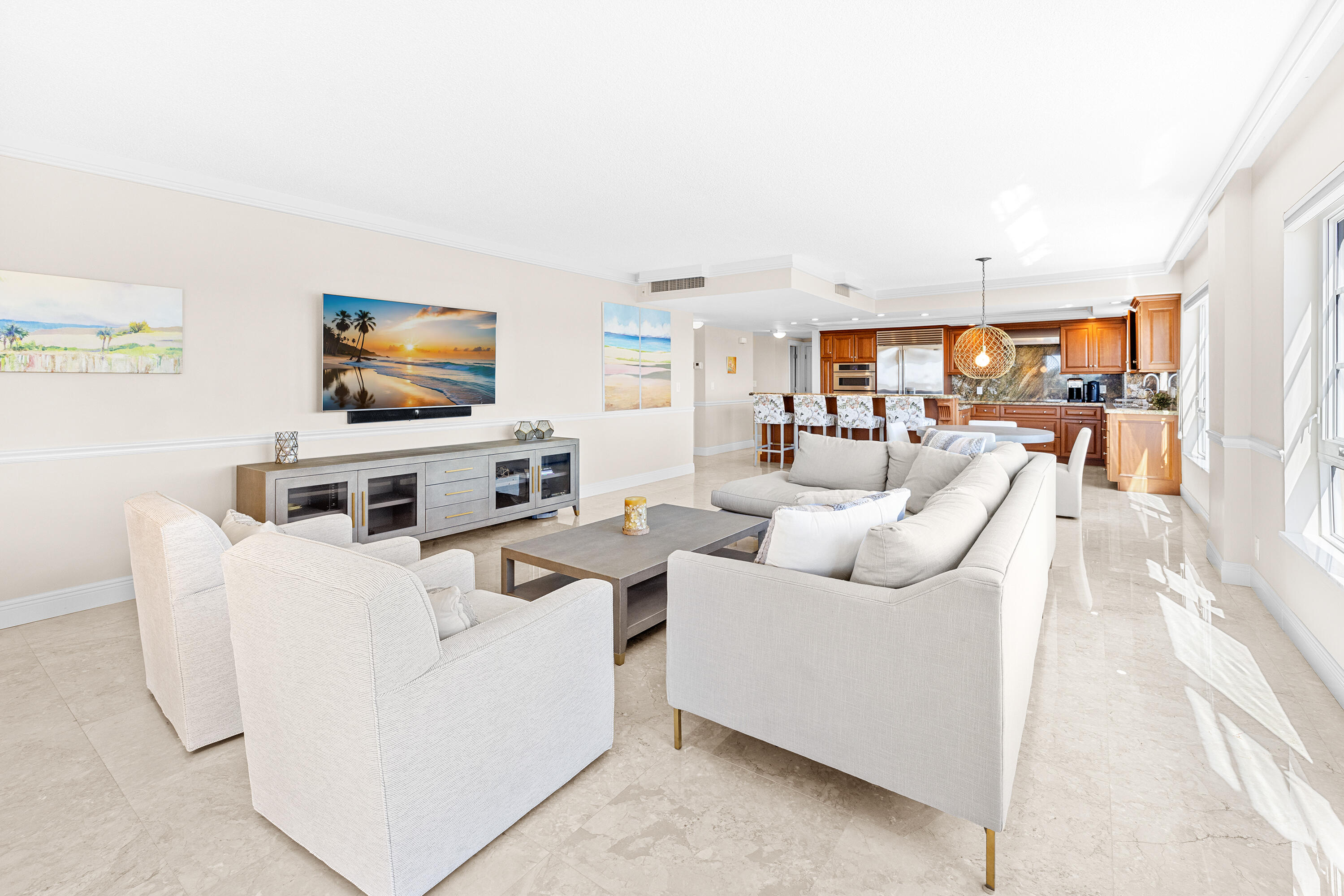 50 E Road, Unit 6E Delray Beach, FL 33483 - Photo 6 of 36 a living room with furniture and a flat screen tv