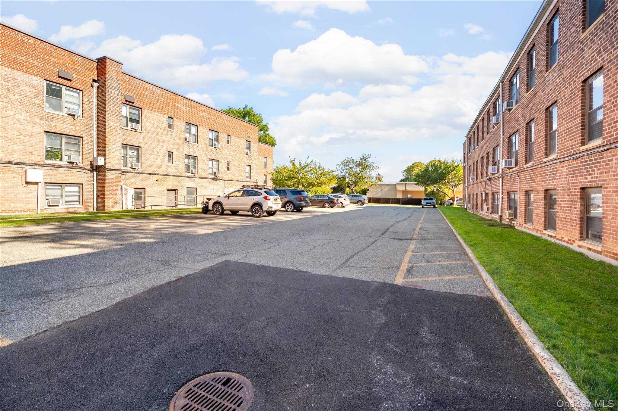 340 Richbell Road, Unit B4 Mamaroneck, NY 10543 - Photo 22 of 24 a view of a street with a building in the background