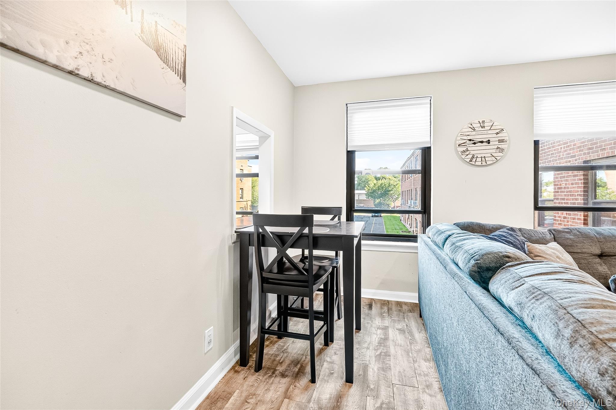 340 Richbell Road, Unit B4 Mamaroneck, NY 10543 - Photo 7 of 24 a living room with a couch and a table