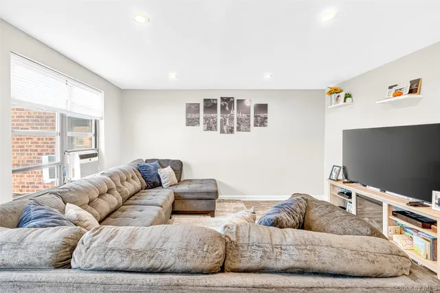 a living room with a couch and a table