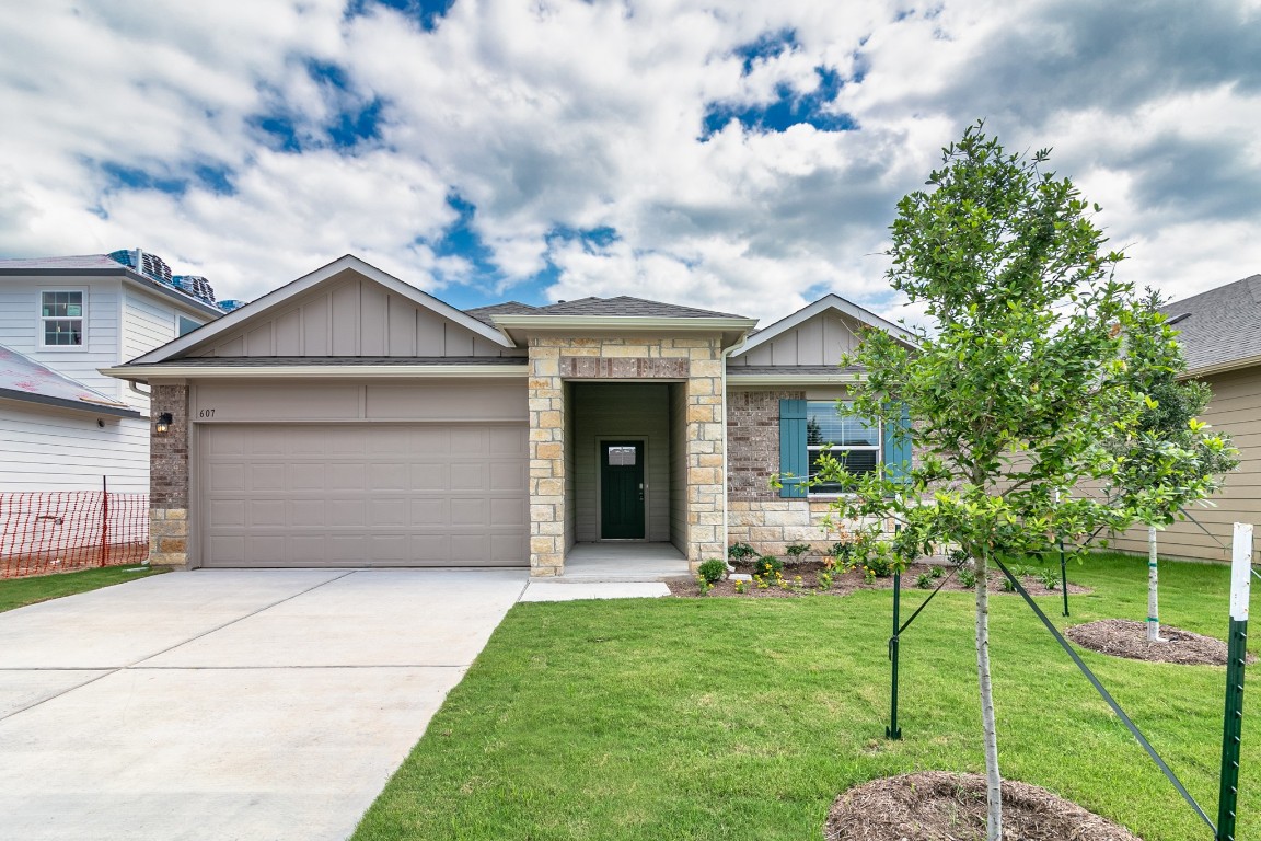 a house view with a garden space