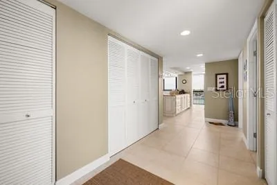 a view of a living room with windows