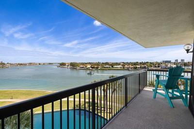 9425 Blind Pass Road, Unit 408 St. Pete Beach, FL 33706 - Photo 24 of 57 a view of city from a balcony