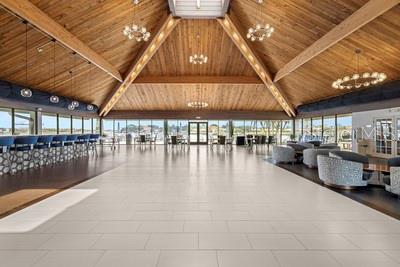 9425 Blind Pass Road, Unit 408 St. Pete Beach, FL 33706 - Photo 30 of 57 a swimming pool with outdoor seating and yard