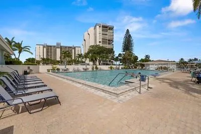 a view of a swimming pool with a lake view