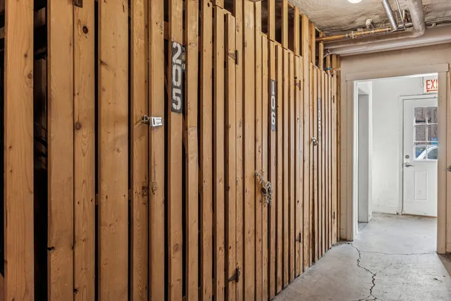 a living room with dryer and washer