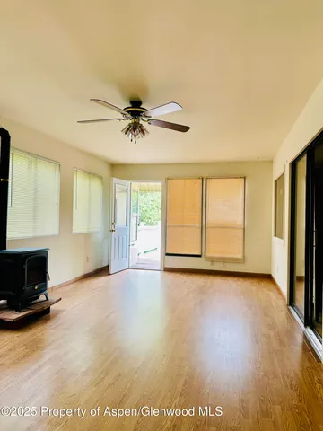 a view of deck with wooden floor and fence