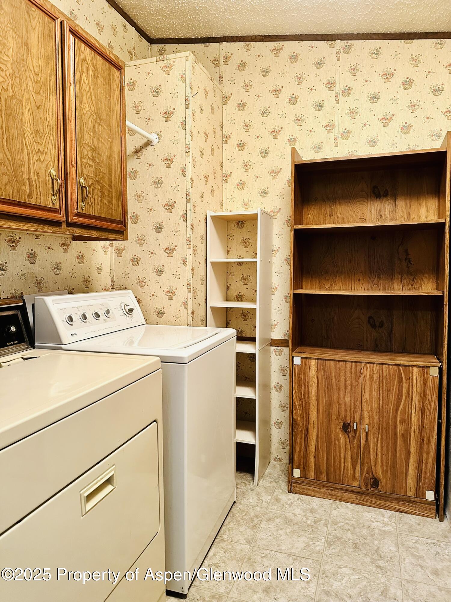 3195 F Road, Unit 1 Grand Junction, CO 81504 - Photo 17 of 22 a utility room with dryer and washer