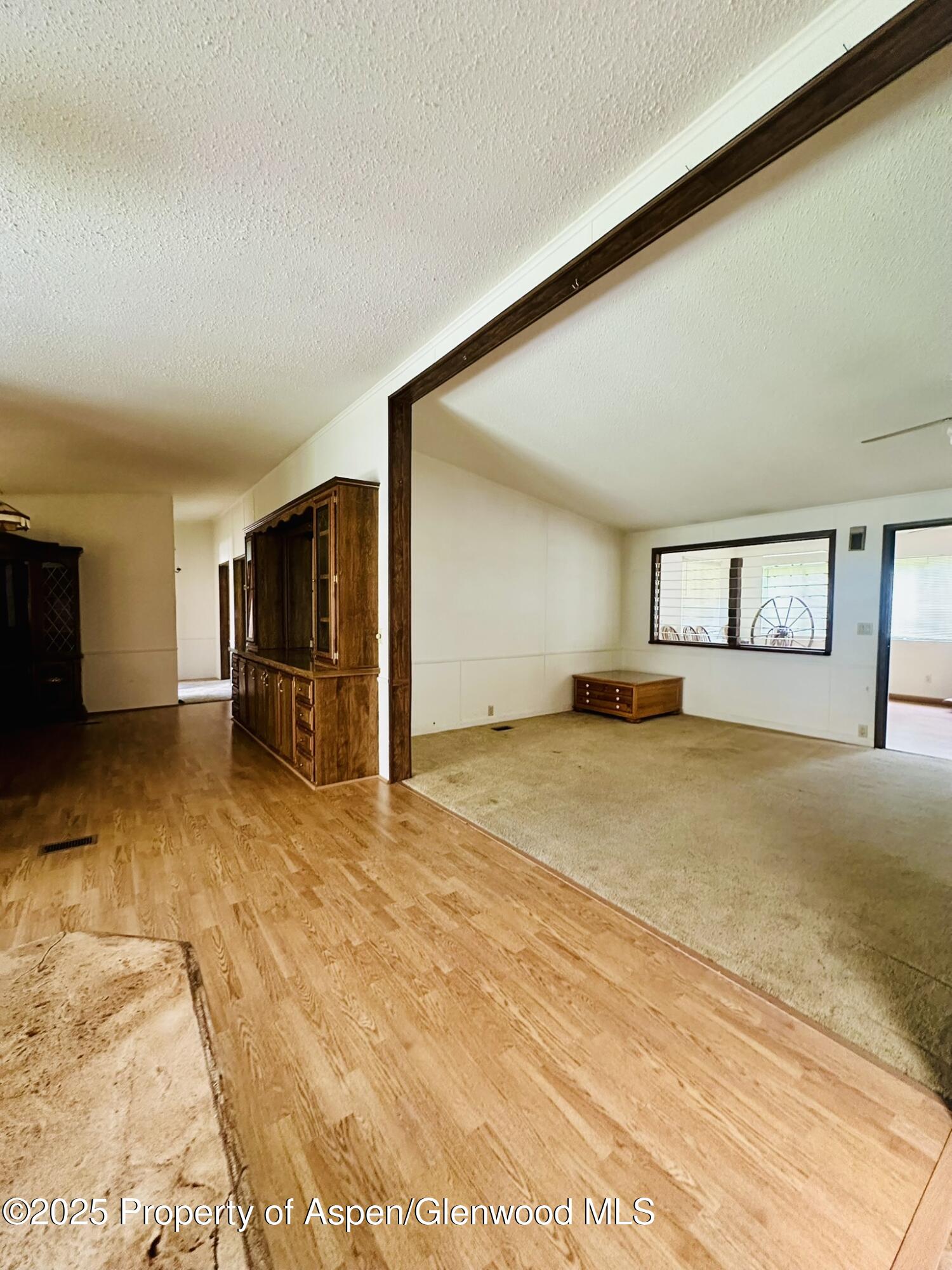3195 F Road, Unit 1 Grand Junction, CO 81504 - Photo 7 of 22 a big room with a yard