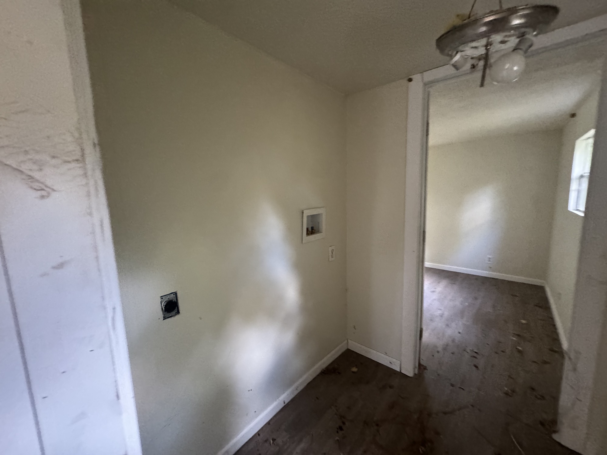 20683 Parkside Street Chandler, TX 75758 - Photo 5 of 6 an empty room with wooden floor and windows