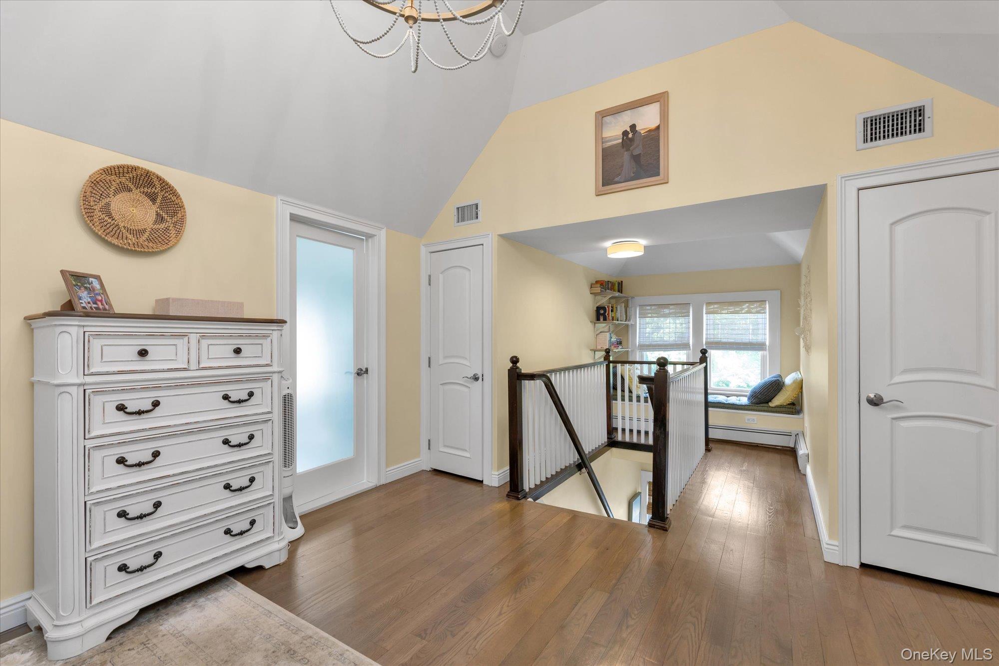 80 Skunks Misery Road Locust Valley, NY 11560 - Photo 18 of 25 a view of a livingroom with furniture and a ceiling fan