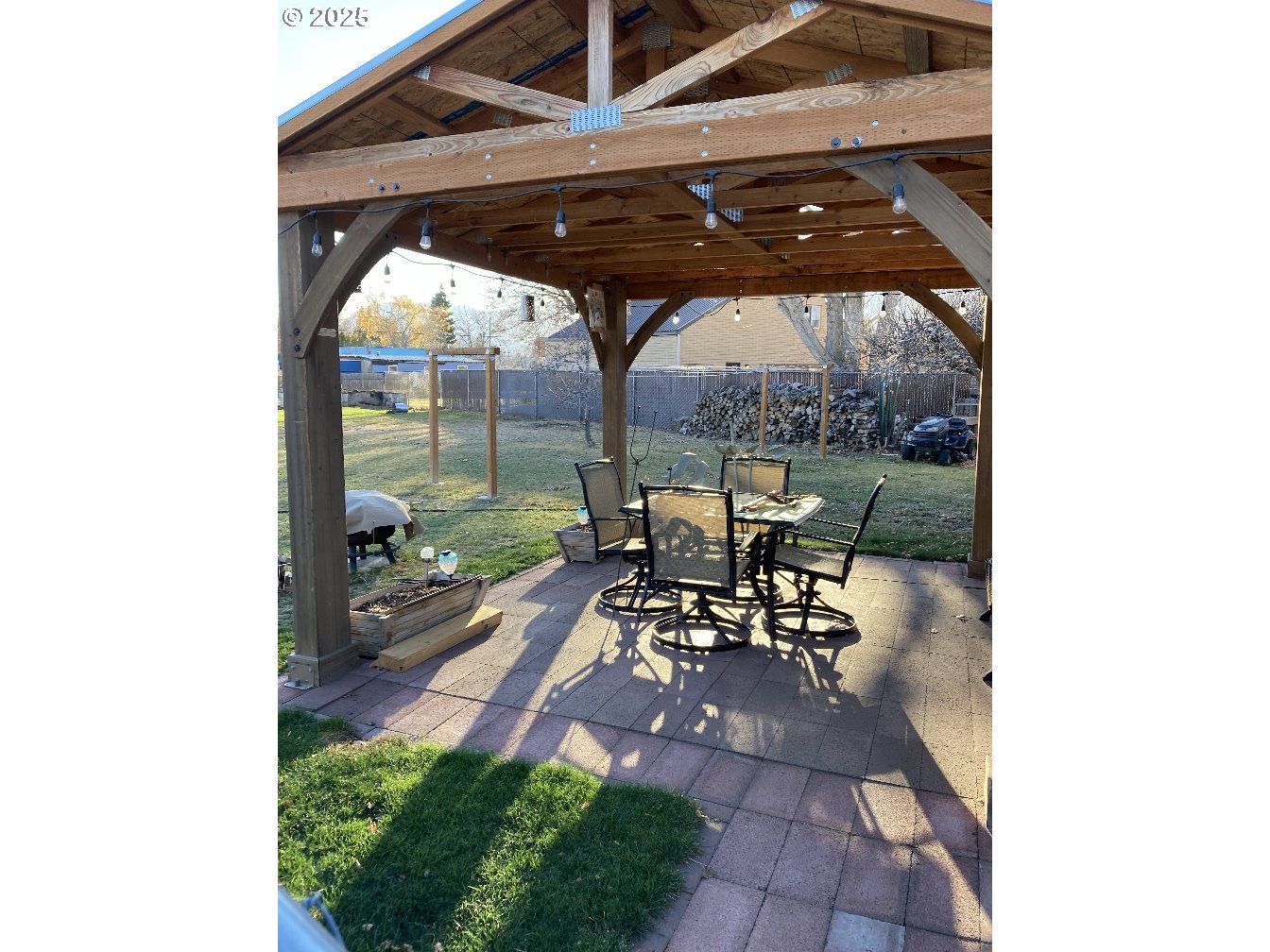 650 East Chestnut Street Union, OR 97883 - Photo 15 of 21 a view of a patio with table and chairs under an umbrella